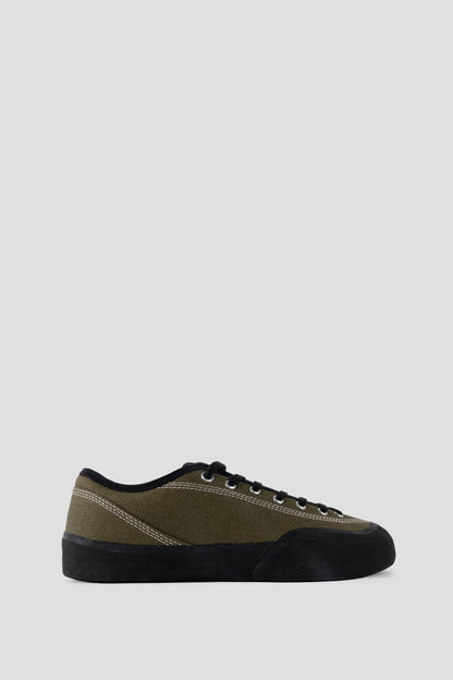 VILLAGEPM 1.30PM OLIVE